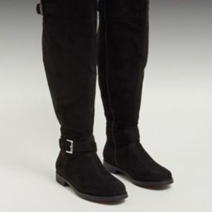Black buckle strap over the knee boots
